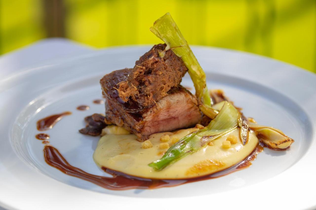 The Vintage House - Douro Hotel Pinhao Bagian luar foto A prepared dish of beef tenderloin